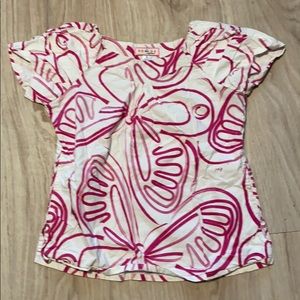 White and pink scrub top! Pockets on sides.